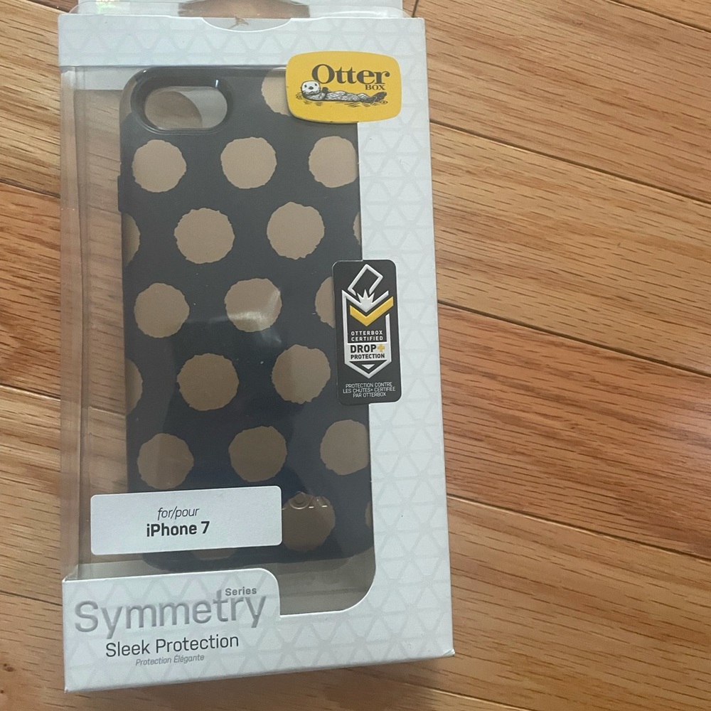 Navy blue and gold IPhone 7 Otterbox. Never used.